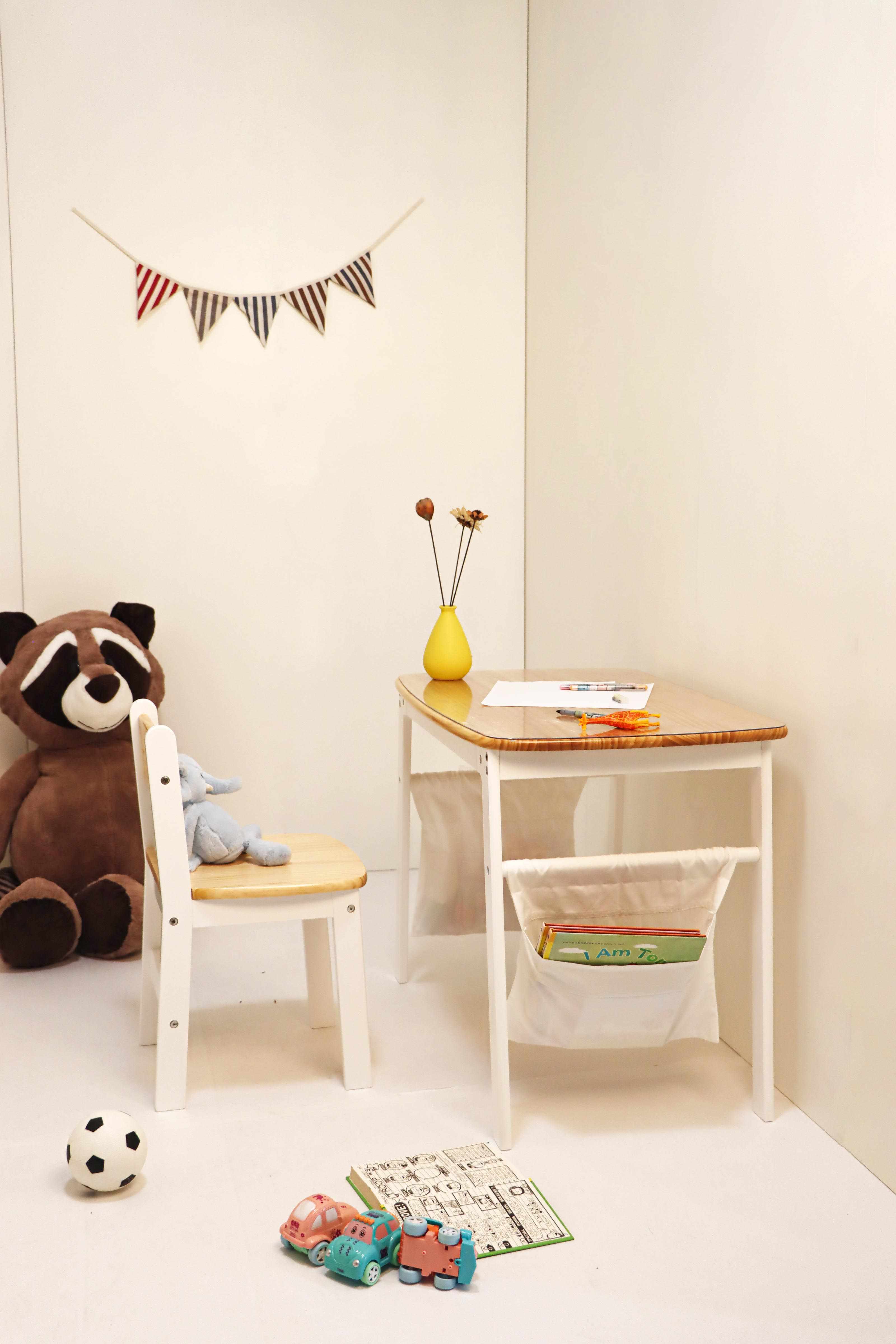 Damoch Family Desk with storage bags against the wall, creating a learning corner for kids