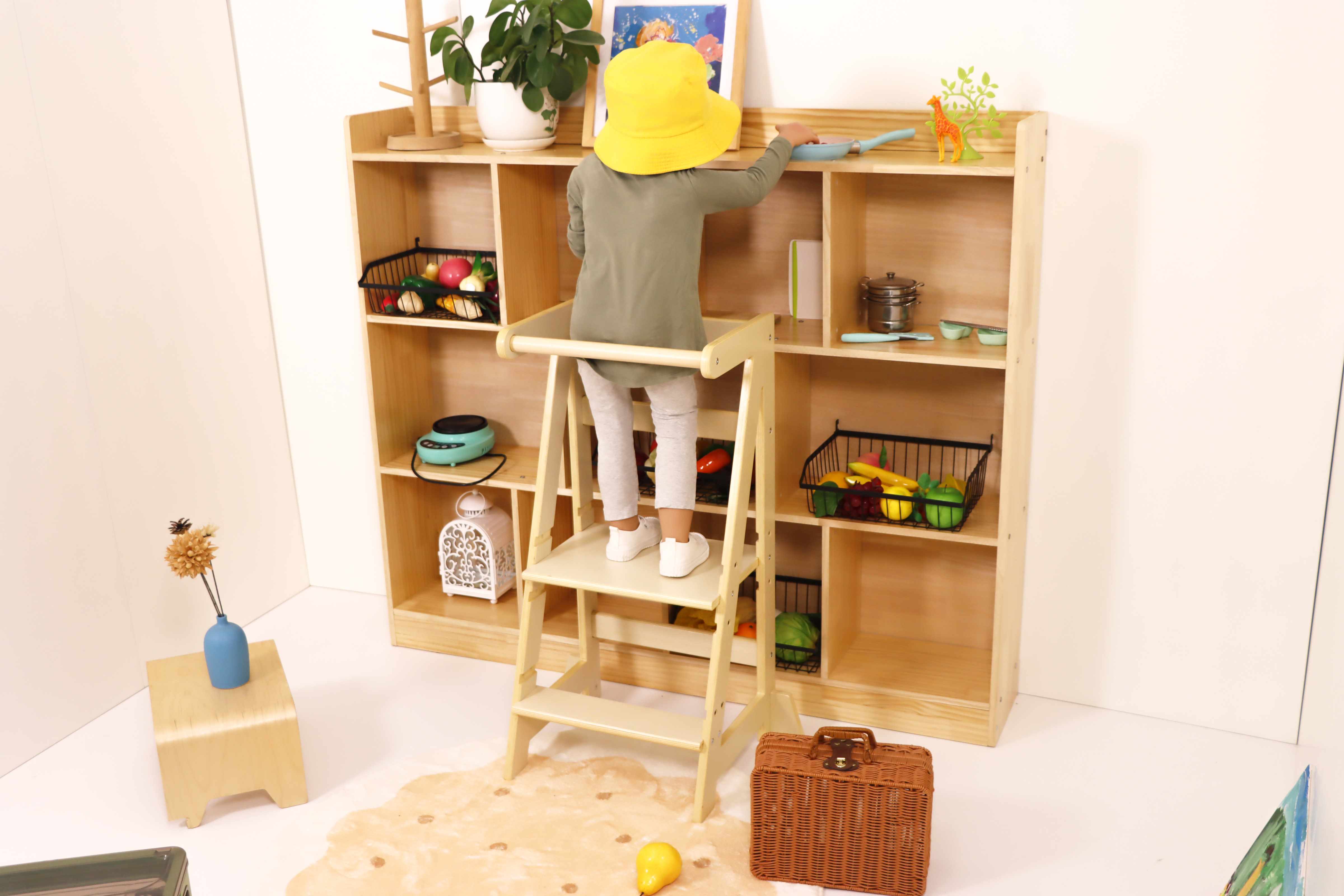 Montessori wooden kitchen tower with safety rails. Adjustable height. Toddler cooking and crafting helper. Natural wood.
